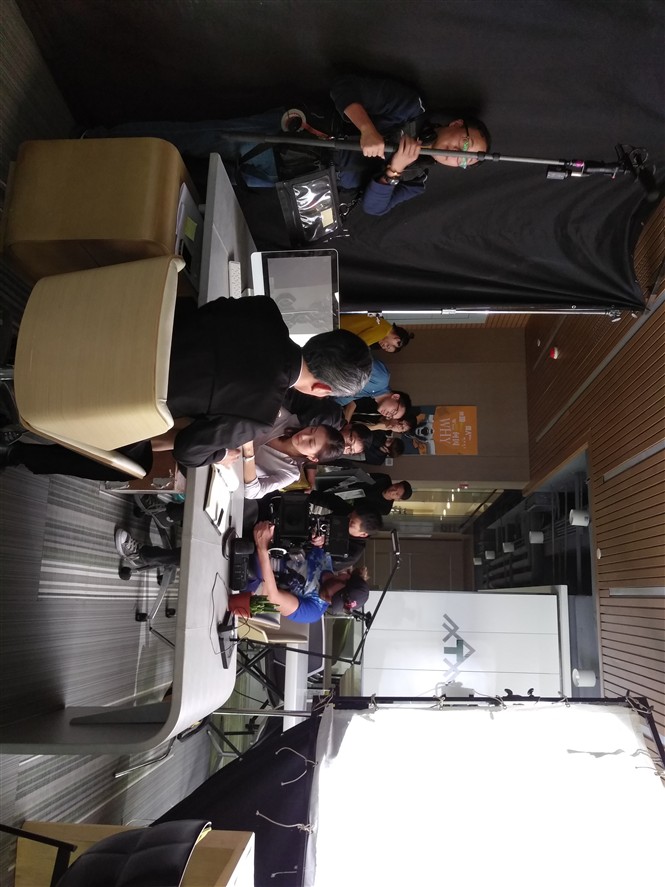 Production support team managing an interview-led shoot in Beijing